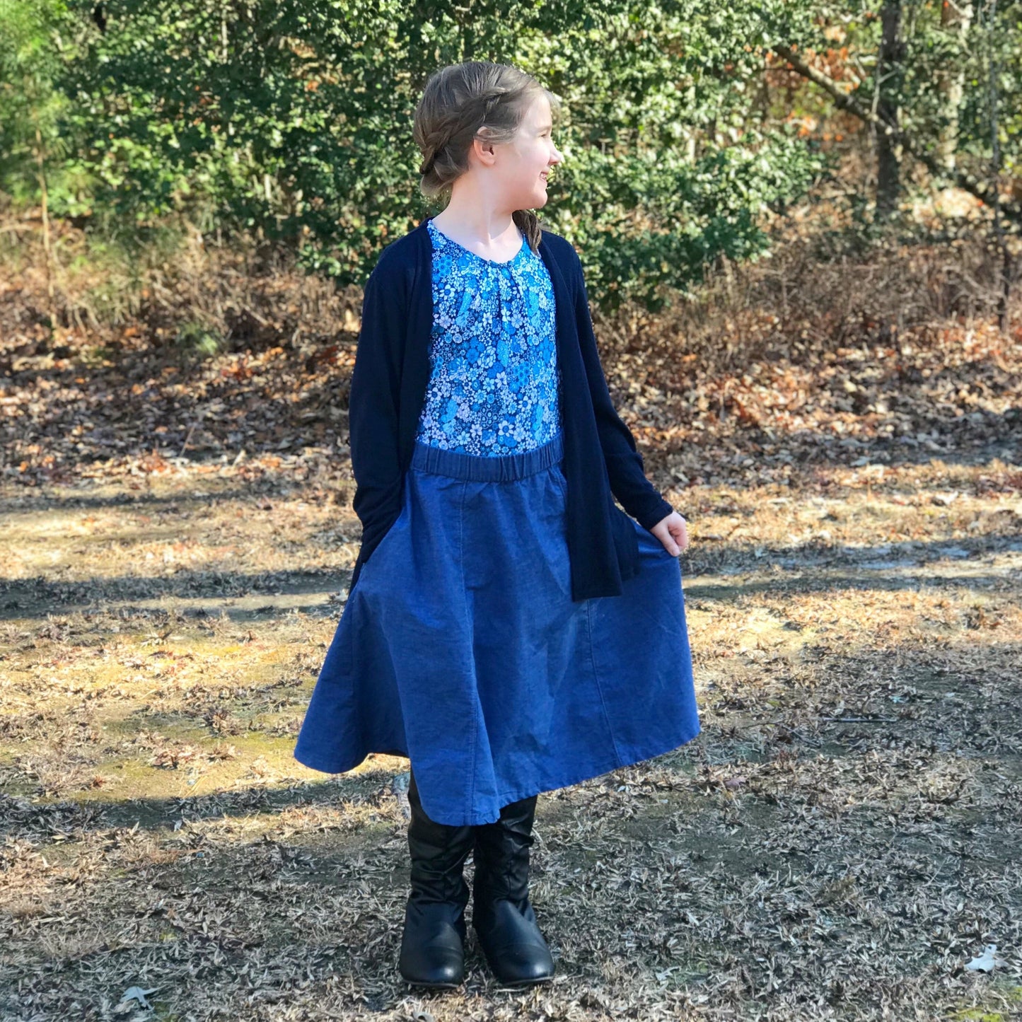 Modeled Picture of The Evelyn Style Skirt for girls, with an aline flare and adjustable waistband