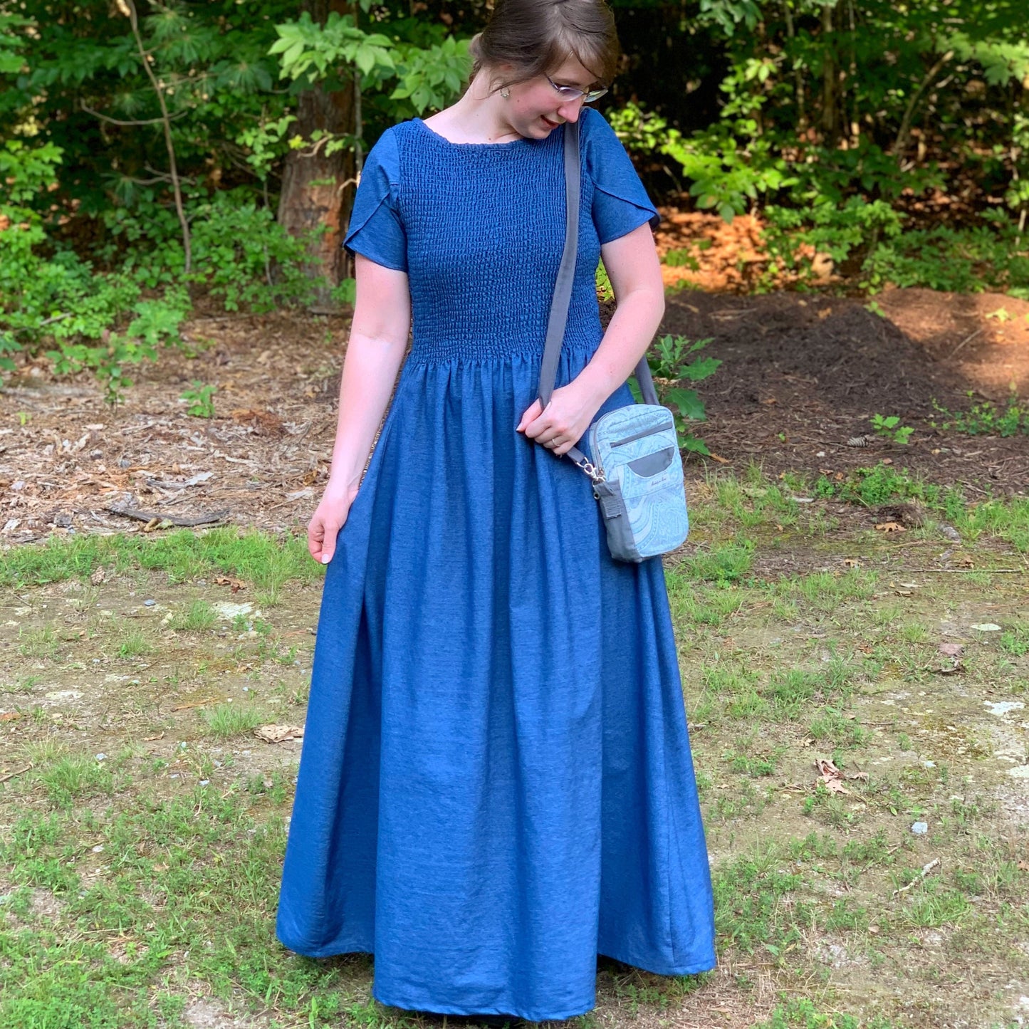 Modest denim maxi dress with smocking at the top and petal style sleeves