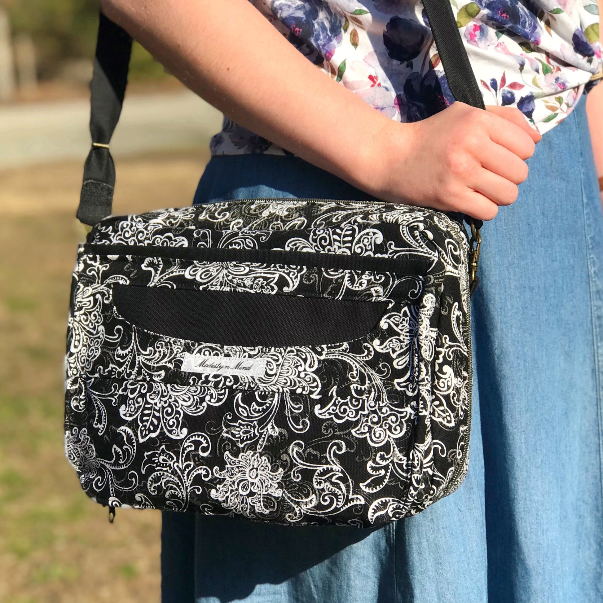 Front side view of a black white and charcoal print bible bag example